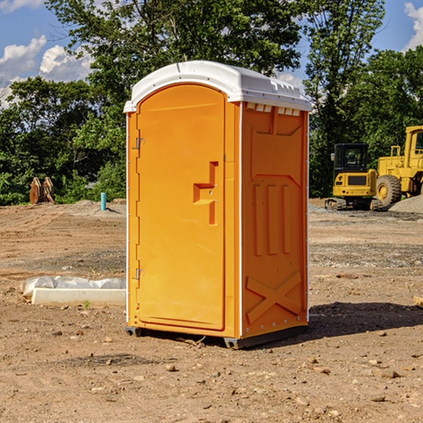 what is the cost difference between standard and deluxe portable toilet rentals in Williford